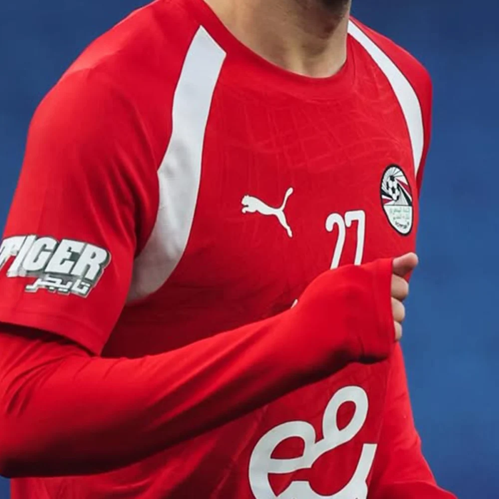 ttrw2 Maillot d'entraînement pro graphique rouge/blanc Égypte 26/27