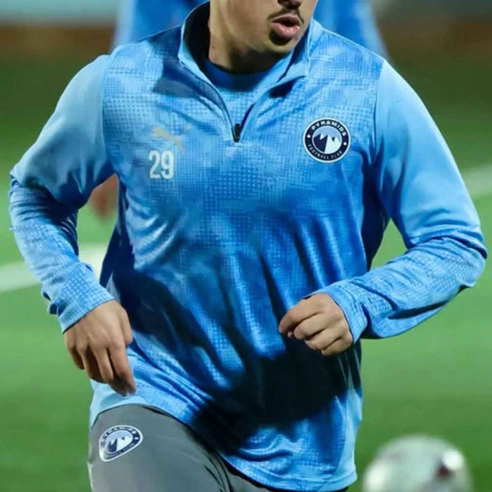 Sweat 1/4 zip graphique bleu ciel PYRAMIDS FC 26/27